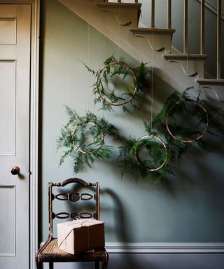 Wooden embroidery hoops wraped with asparagus ferns